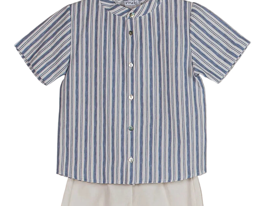 Striped shirt and white shorts set on a beige background