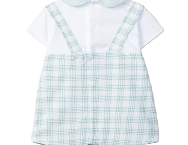 Children's outfit with white shirt and blue checkered overalls on a light gray background