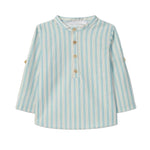 Striped shirt with buttons on a light gray background