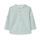 Striped shirt with buttons on a light gray background