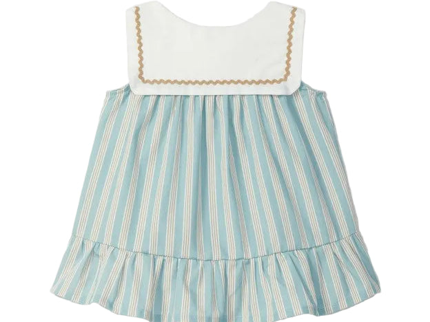 Children's dress with striped skirt and white top on a light gray background