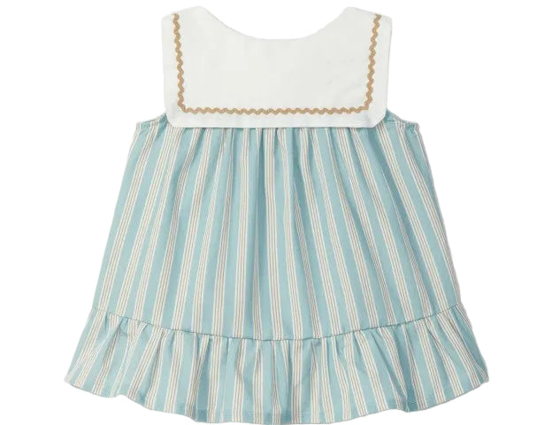 Children's dress with striped skirt and white top on a light gray background