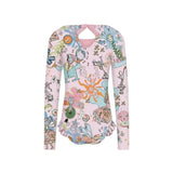 Colorful long-sleeve shirt with a cartoon pattern on a light gray background