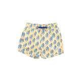 Yellow swim shorts with blue whale pattern on a white background