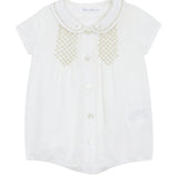 White blouse with lace details on a white background