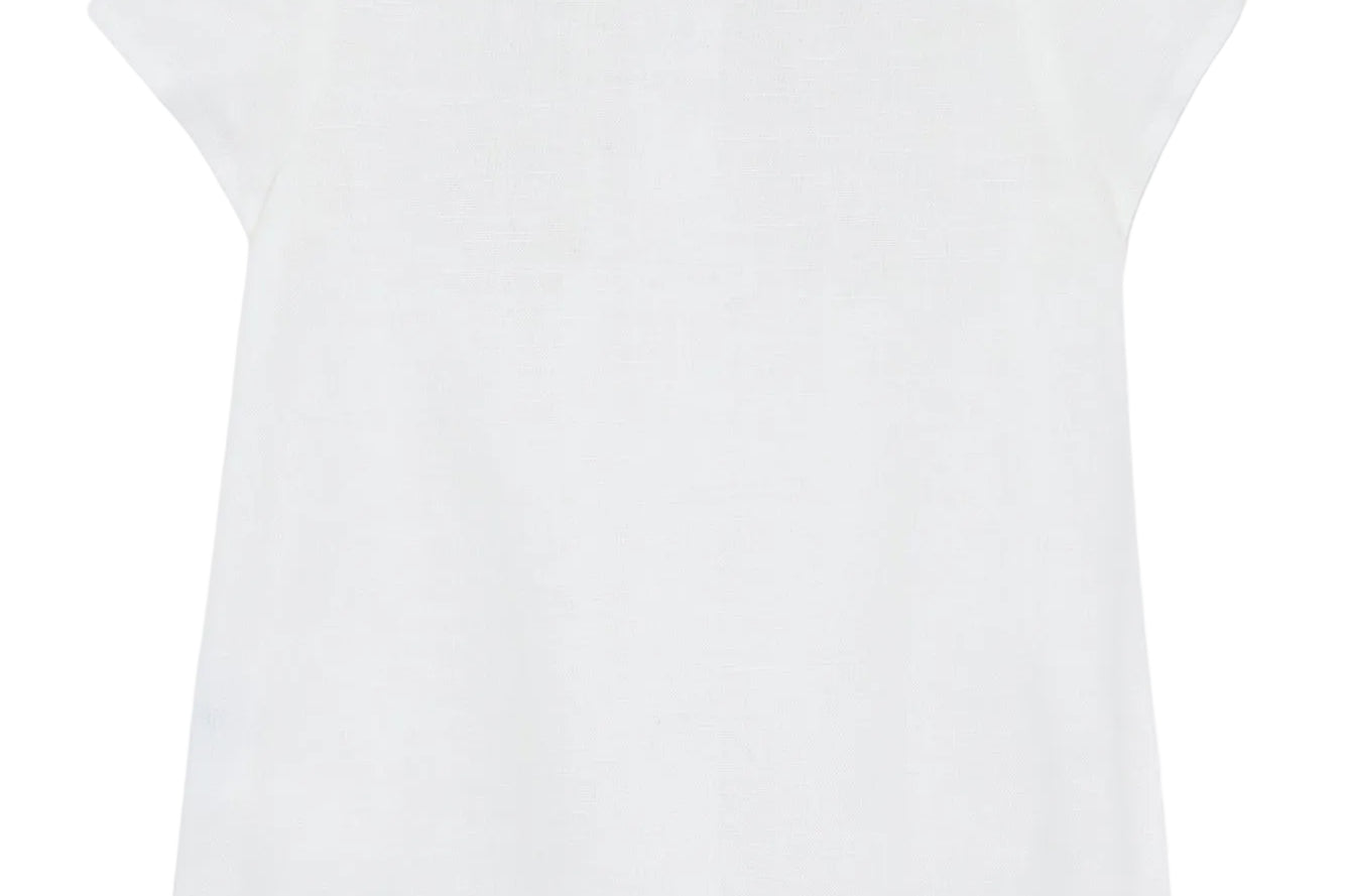 White sleeveless top on a light beige background
