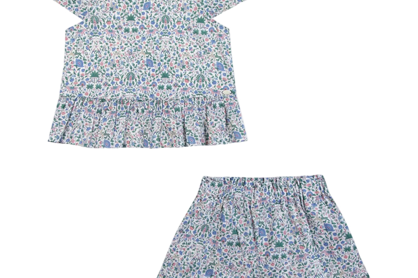 Floral top and shorts set on a white background