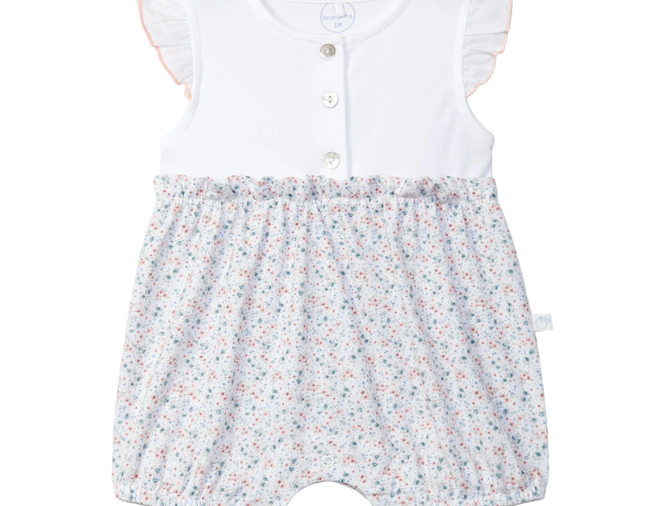 Baby romper with floral pattern on a light gray background