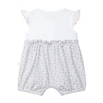 Baby romper with floral shorts and white top on a light gray background